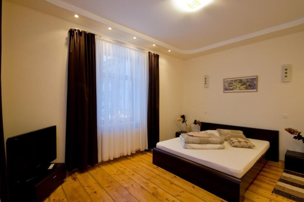 Hotel Viesu Maja Janis à Madona Chambre photo